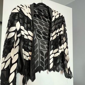 Black and white moto jacket